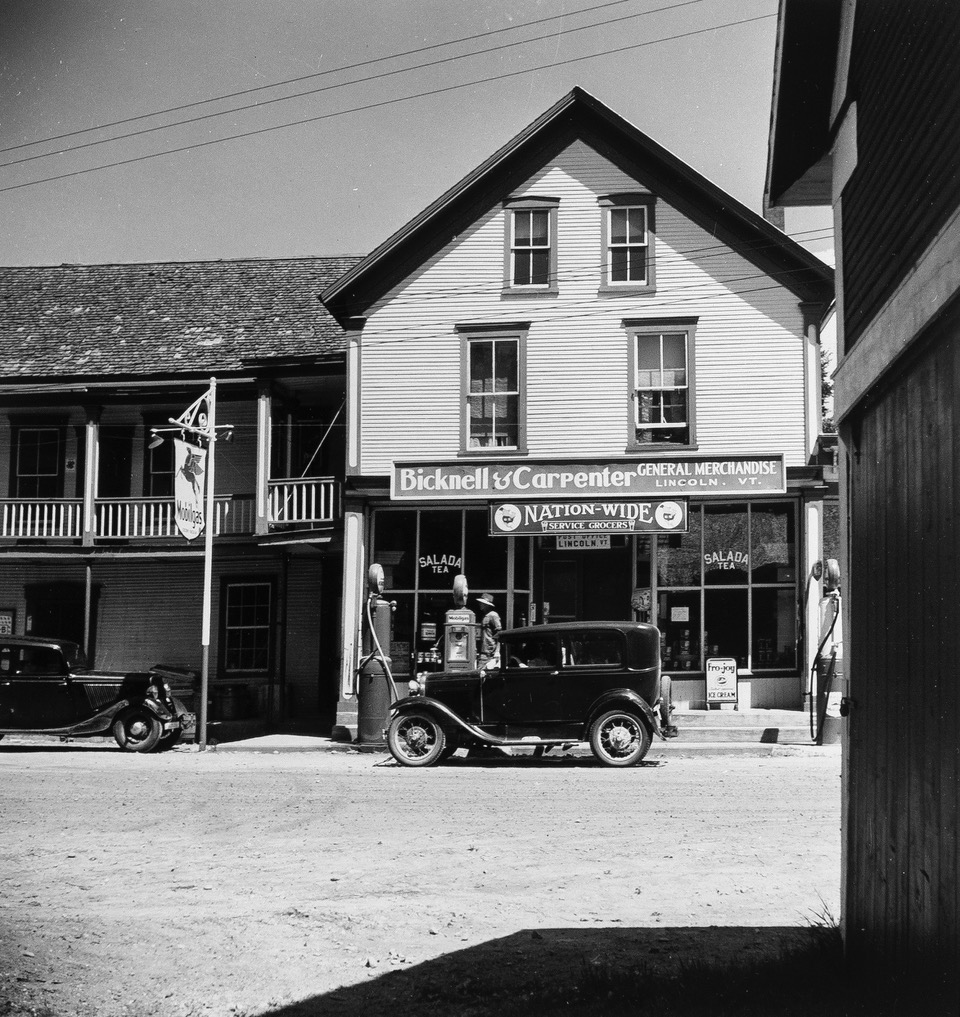Louise Rosskem (1910 - 2003). Country store with car parked in front. Lincoln, Vermont. July 1940.