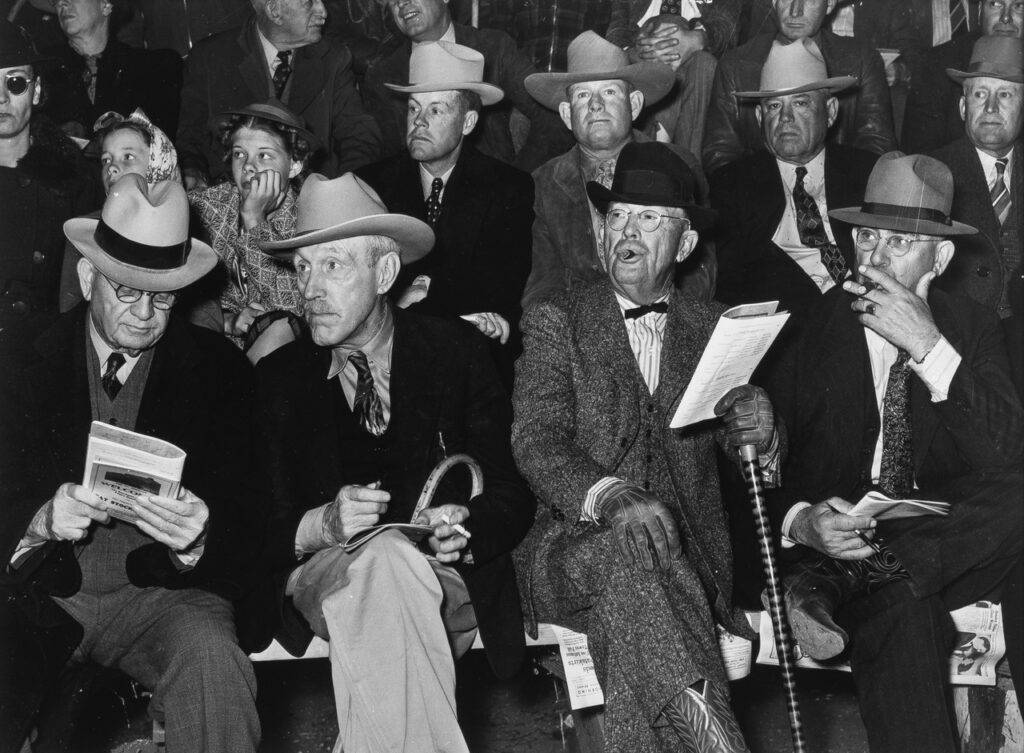 Russell Lee (1903 - 1986). Cattlemen at auction of prize beef steers and breeding stock at San Angelo Fat Stock Show. San Angelo, Texas. March 1940.