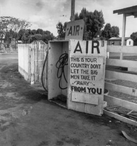 Dorothea Lange (1895 - 1965). Gas station. Kern County, California. November 1938.