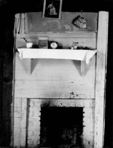 Walker Evans (1903 - 1975). Fireplace in bedroom of Floyd Burroughs' cabin. Hale County, Alabama. Summer 1936.