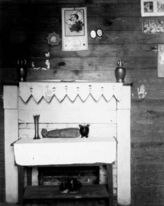 Walker Evans (1903 - 1975). Fireplace and objects in a bedroom of Floyd Burrough's home. Hale County, Alabama. Summer 1936.
