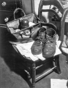 Jack Delano (1914 -1997). Shoes and lunch taken by Mr. Fairchild to work at a steel works in Boston, Massachusetts. He is a vegetable farmer near Saugus, Massachusetts. Saugus, Massachusetts. January 1941