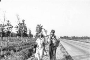 Carl Mydans (1907 - 2004). "Damned if we'll work for what they pay folks hereabouts." Crittenden County, Arkansas. Cotton workers on the road, carrying all they possess in the world. Crittenden County, Arkansas. May 1936.