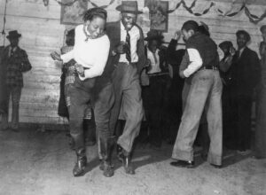 Marion Post Wolcott (1910 - 1990). Jitterbugging in Negro juke joint, Saturday Night. Clarksdale, Mississippi. November 1939.