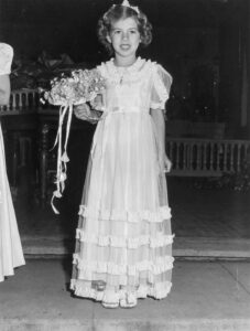Russell Lee (1903 - 1986). Maid to the queen of the fiesta of the Holy Ghost. Santa Clara, California. May 1942. Gift of Maureen Fenton.