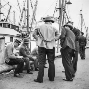 John Collier Jr. (1913 - 1992). Italian fishermen gathered on Fisherman's Wharf. San Francisco, California. December 8, 1941.
