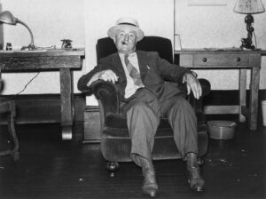 John Vachon (1914 - 1975). Traveling salesman in hotel lobby. Elkins, West Virginia. June 1939.