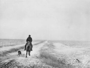 John Vachon (1914 - 1975). Riding out to bring the cattle. First stages of snow blizzard. Lyman County, South Dakota. November 1940.