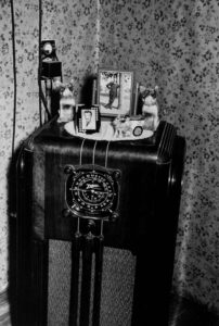 Russell Lee (1903 - 1986) Radio with ornaments and decorations in home of FSA (Farm Security Administration) client near Caruthersville, Missouri. August 1938.