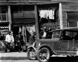 Walker Evans (1903 - 1975). Vicksburg Negroes and shop front. Vicksburg, Mississippi. March 1936.