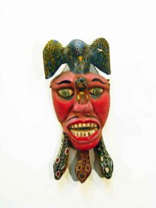 Carnival Mask, 15" x 7" x 5", sculpture, carved wood and paint, artist unknown