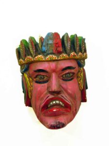 Carnival Mask, 10' x 7" x 5", sculpture, carved wood and paint, artist unknown