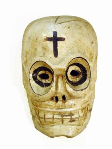 Skull for Dia de Los Muertos, 10" x 7" x 4", sculpture, carved wood and paint, artist unknown