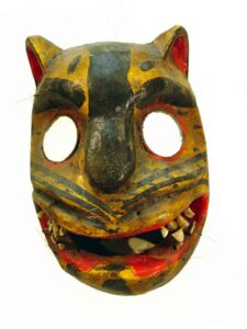 Tigre (Jaguar), 12" x 9" x 7", sculpture, carved wood and paint, hair, teeth and mirrors, artist unknown