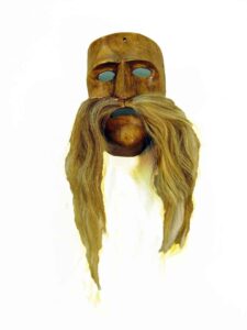 Viejo, Tastoan Festival, 18" x 9" x 5", sculpture, carved wood, hair and paint, artist unknown