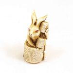 Rabbit pounding mochi (sweet rice), sculpture, ivory, artist unknown