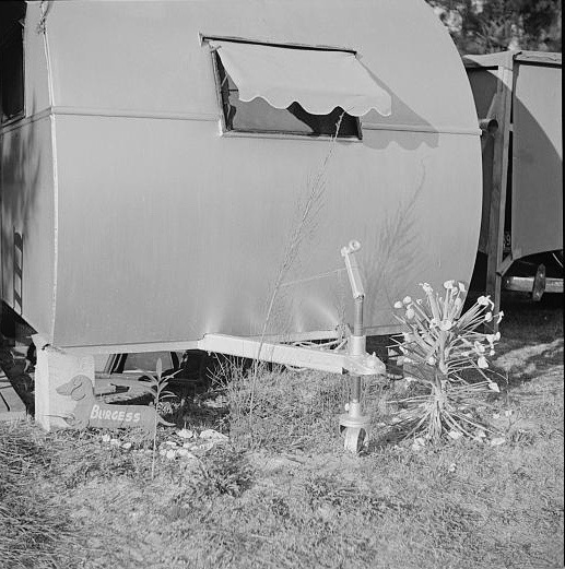 Marion Post Wolcott (1910 - 1990). A garden in front of a trailer. Sarasota, Florida. January 1941.
